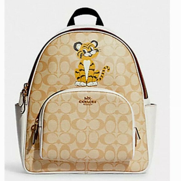 Coach Handbags - Coach Court Backpack Year of the Tiger Signature Canvas Gold Light Khaki